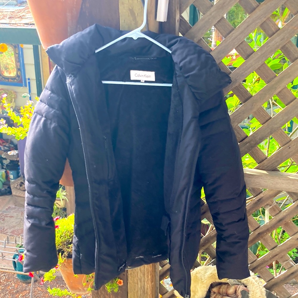 Cali in Klein puffer jacket with hood
